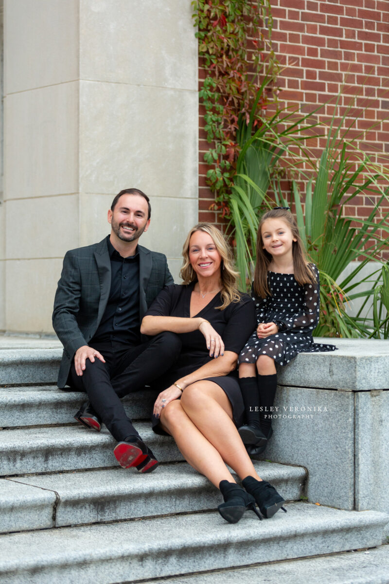 family portraits, wilmington nc family photographer, family of three, downtown wilmington, urban family portraits, children portraits, child, what to wear family session, what to wear black clothes, parents, loving family, sweet girl, family photography