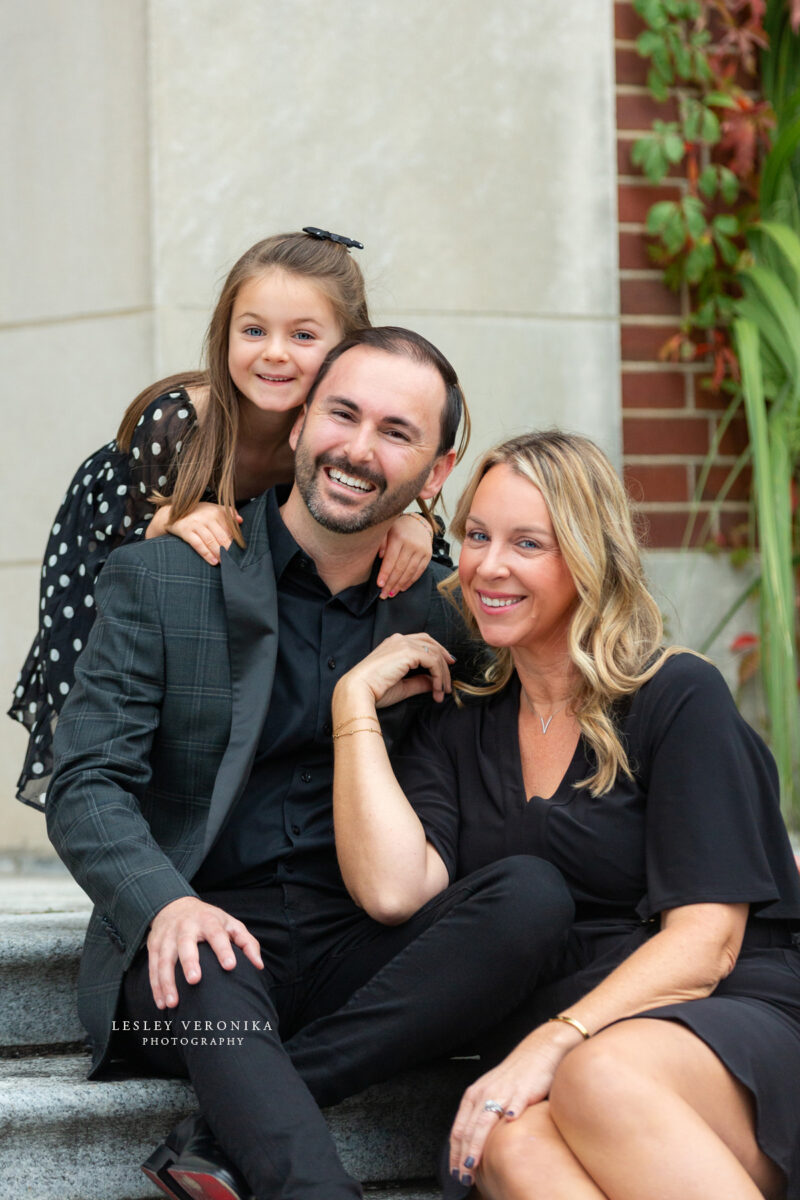 family portraits, wilmington nc family photographer, family of three, downtown wilmington, urban family portraits, children portraits, child, what to wear family session, what to wear black clothes, parents, loving family, sweet girl, family photography