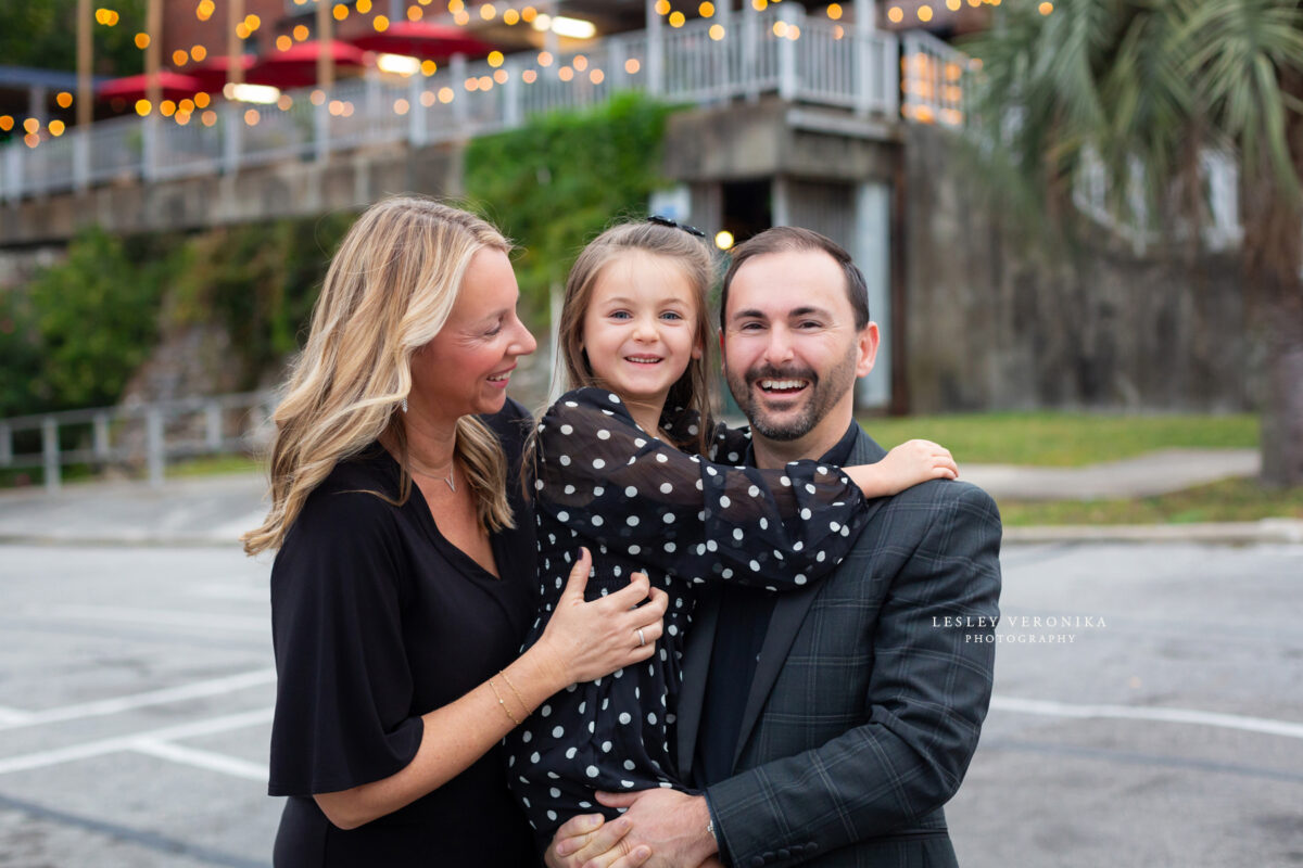 family portraits, wilmington nc family photographer, family of three, downtown wilmington, urban family portraits, children portraits, child, what to wear family session, what to wear black clothes, parents, loving family, sweet girl, family photography