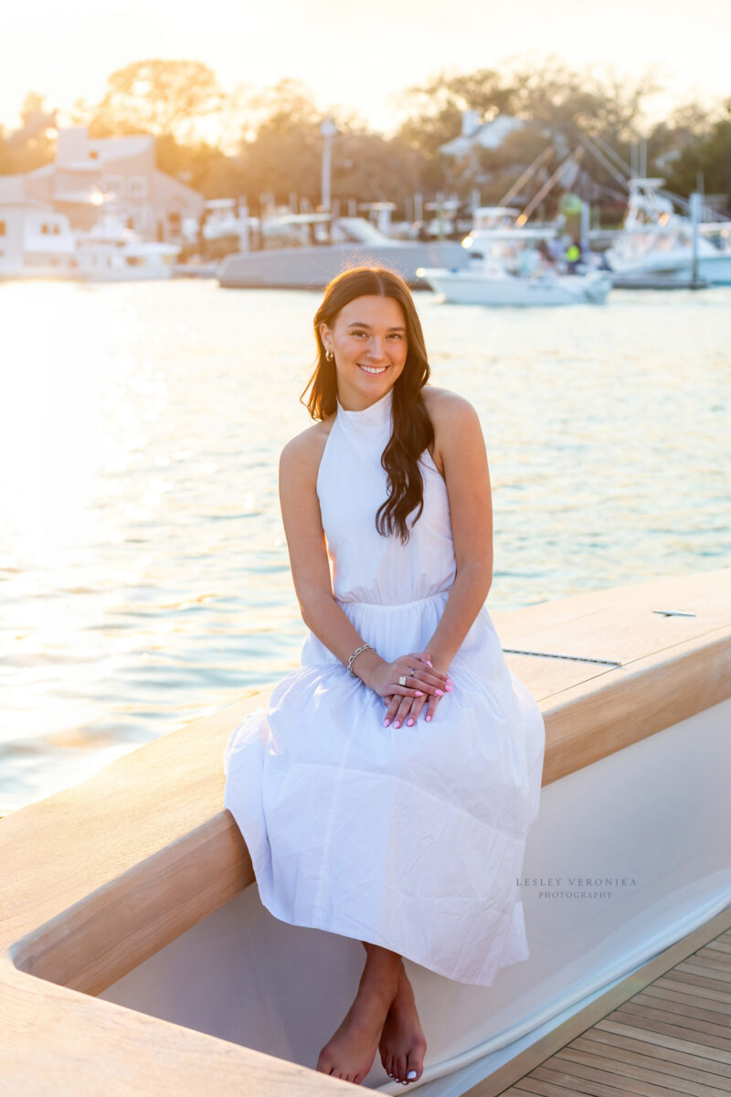 senior photographer, Senior portrait session, wrightsville beach nc, boat, yacht, yacht club, senior portraits on a boat, beach senior portraits